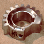 close up of a small metal gear, aviation parts