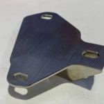 image of a metal door latch manufactured at Integrated Components machine shop